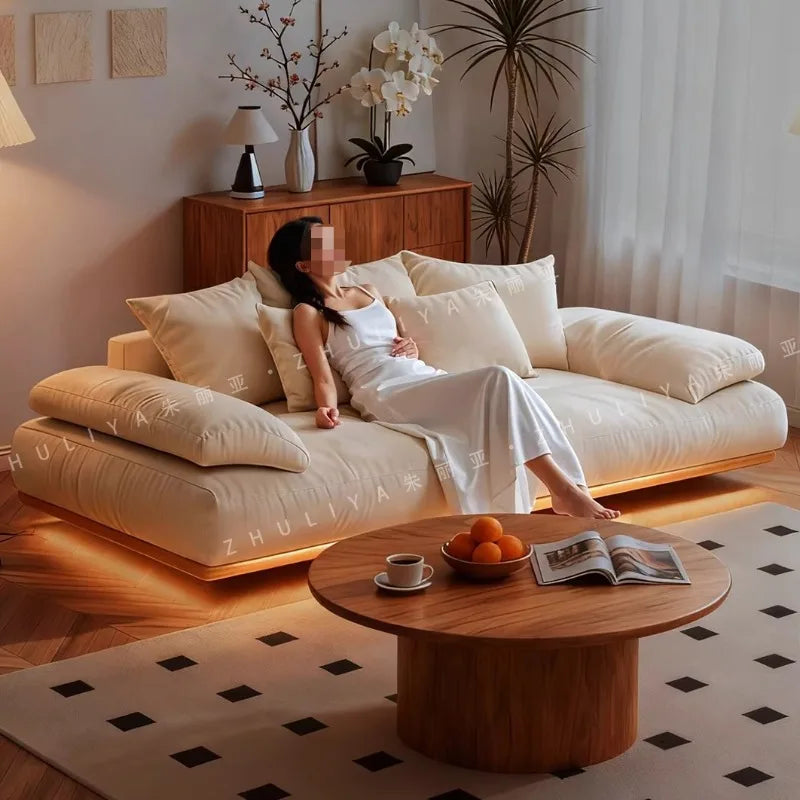 canapé moderne minimaliste beige clair tissu uni coussins relaxants bois frame multifonctionnel salon