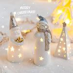 Ornement lumineux d'élan en porcelaine pour intérieur festif