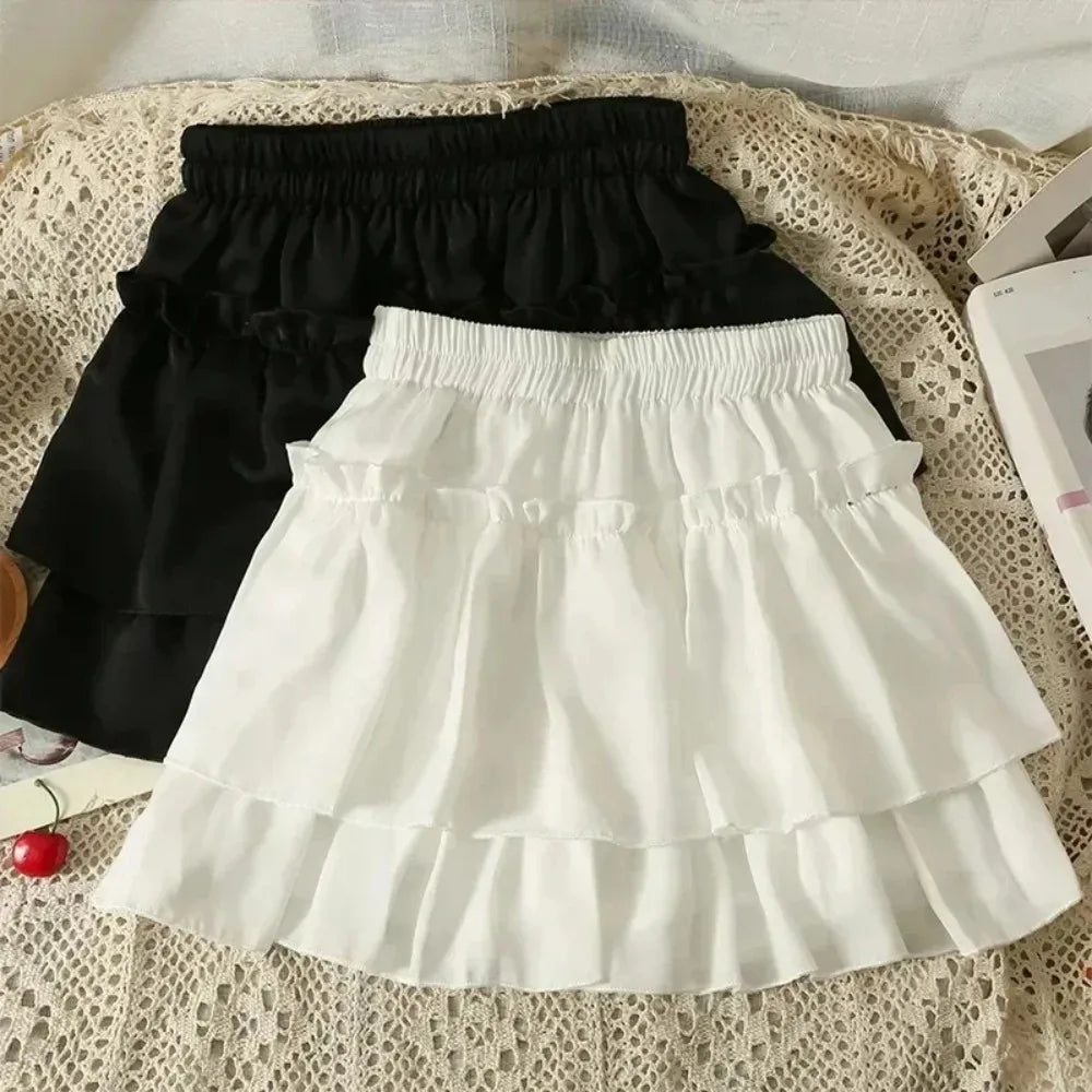 Jupe mini noire blanche rayée plissée classique élégante élastiquée dessus genou été junior femme