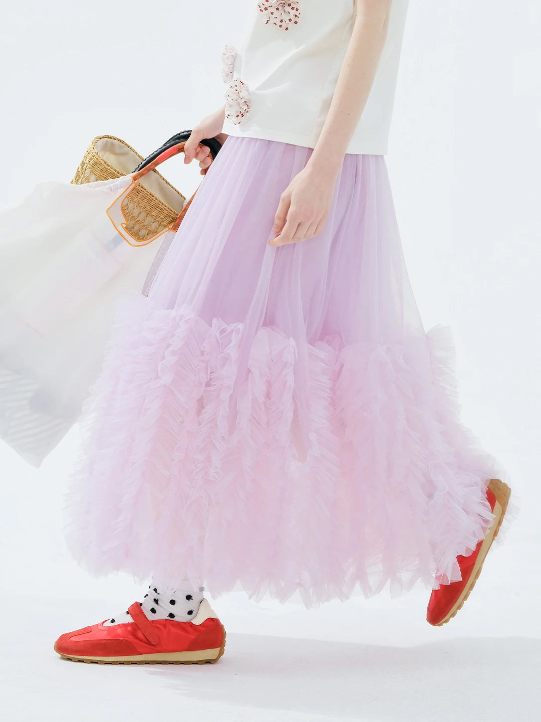 Jupe tulle rose clair élégante féminin ourlets franges translucide été femme