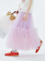 Jupe tulle rose clair élégante féminin ourlets franges translucide été femme