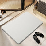 tapis bain pierre diatomite moderne gris légerement rugueux respectueux environnement rapide absorption antidérapant