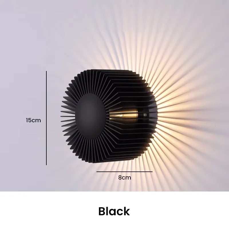 lampe murale moderne structure circulaire lamelles rayonnantes couleur dorée éclairage chambre étude