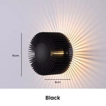 lampe murale moderne structure circulaire lamelles rayonnantes couleur dorée éclairage chambre étude