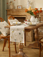 nappe table brodée motifs floraux rustique bohème couleurs chaudes herbes fleurs tissu texturé