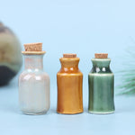 bouteilles vintage céramique bouchons liège vert beige gris clair mat brillant opaques jouet cuisine