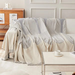couverture canapé moderne rayures horizontales franges beige crème gris clair salon intérieur