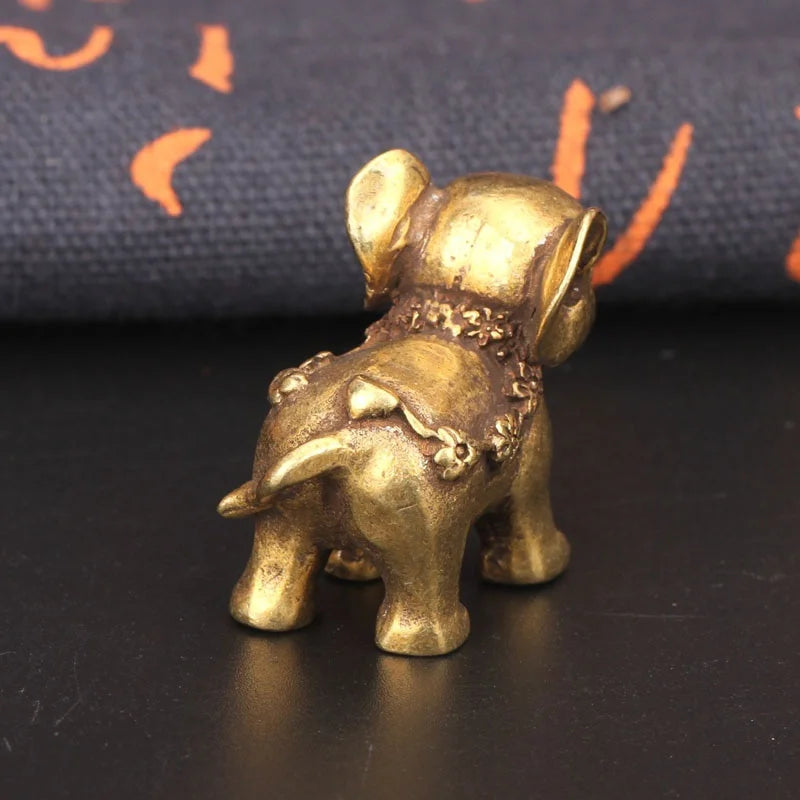 statuette éléphant bronze doré texture peau éléphant motifs floraux traditionnel asiatique décoration maison salon