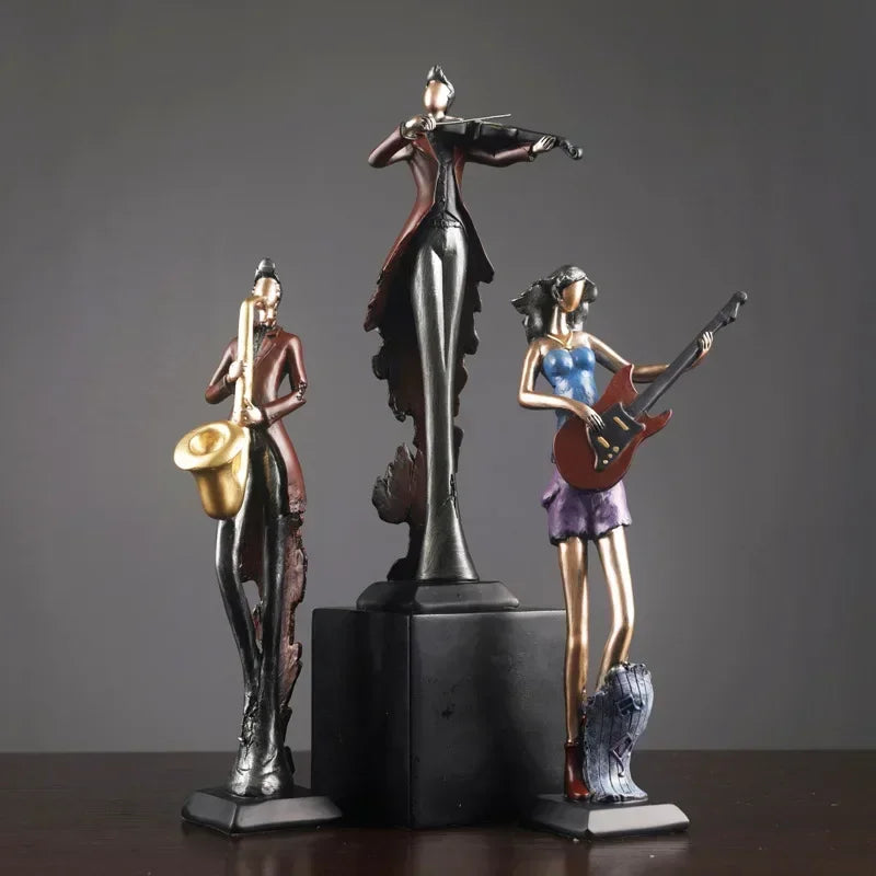statues musiciens noir bleu doré texture métallique art deco instruments musicaux base solide vintage