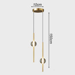 suspension luminaire moderne sphères translucides métal noir or chambre salon intérieur maison
