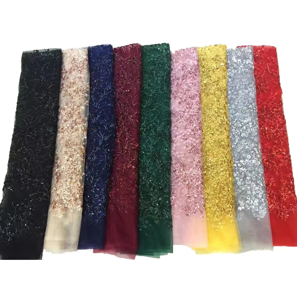 tissu dentelle sequins motifs floraux polyester translucide élégant noir blanc rose vert bleu marine