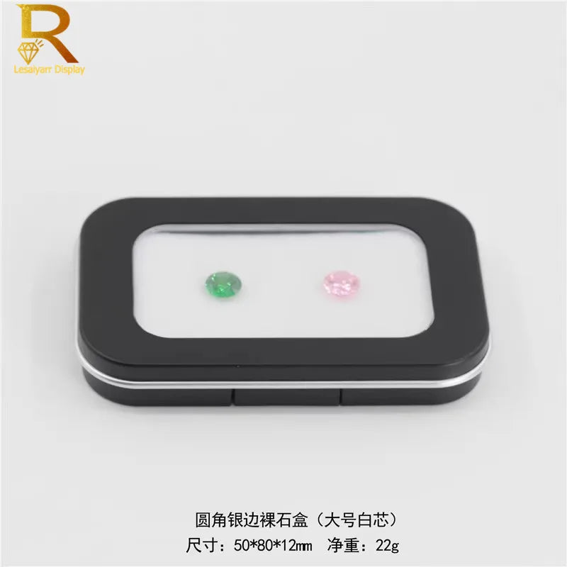 boîtes bijoux noir velours moderne diamants blanc rose vert fentes rectangulaires exposé