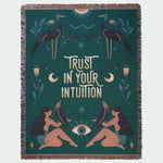 couverture tissée vert foncé femmes oiseaux fleurs lune œil intuition saisonnière nordique frange artisanale