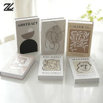 décoration intérieure moderne livre faux blanc motifs abstraits minimaliste chambre table basseDecoration intérieure moderne