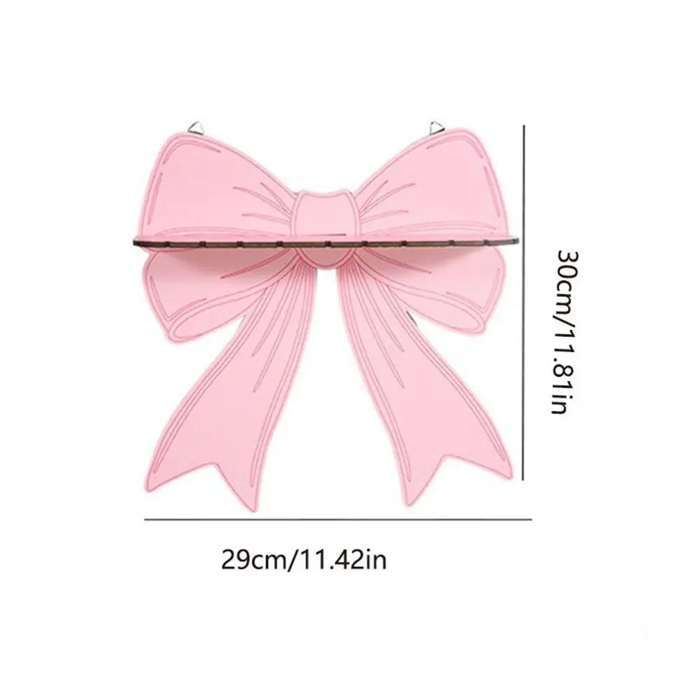 étagère murale bois rose clair motif ruban moderne clips métalliques
