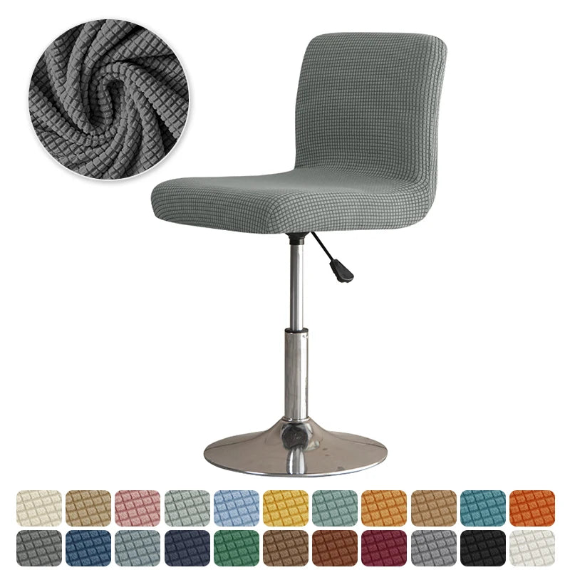 Housse de chaise de bar extensible en polaire bleu marine sur chaise de salle à manger