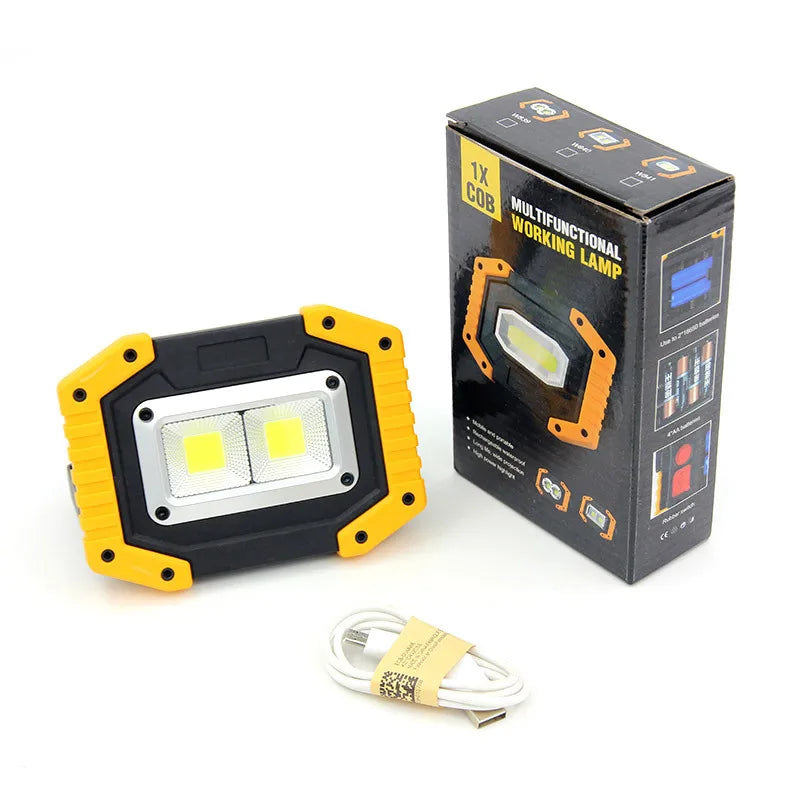 projecteur led multifonctionnel industriel jaune noir compartiment piles usb