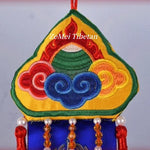 écharpe décorative ethnique brodée couleurs vives motifs floraux pompons traditionnelle intérieur temple