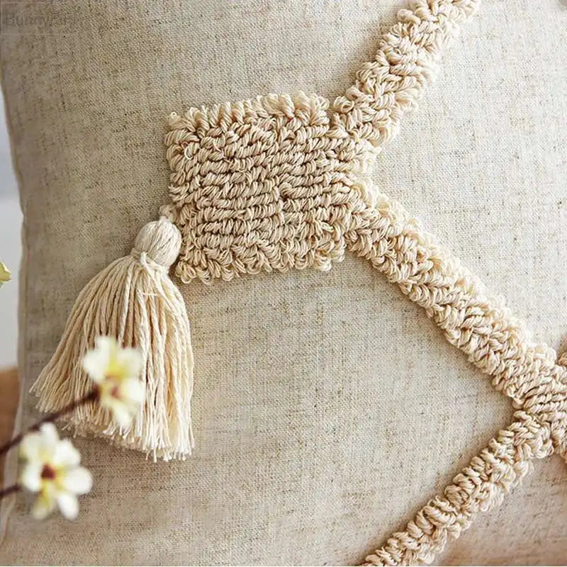 coussin carré beige motif losange texture bouclée décoration maison boho franges