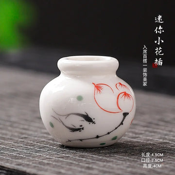 petit pot fleurs céramique blanche motif fleurs artisanal décoration maison plante verte