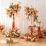 arche décorative boho chic fleurs artificielles orange feuilles vertes franges blanches extérieur mariage anniversaireévénement
