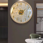 horloge murale moderne or blanc cassé marbre aiguille dorée transparente salon
