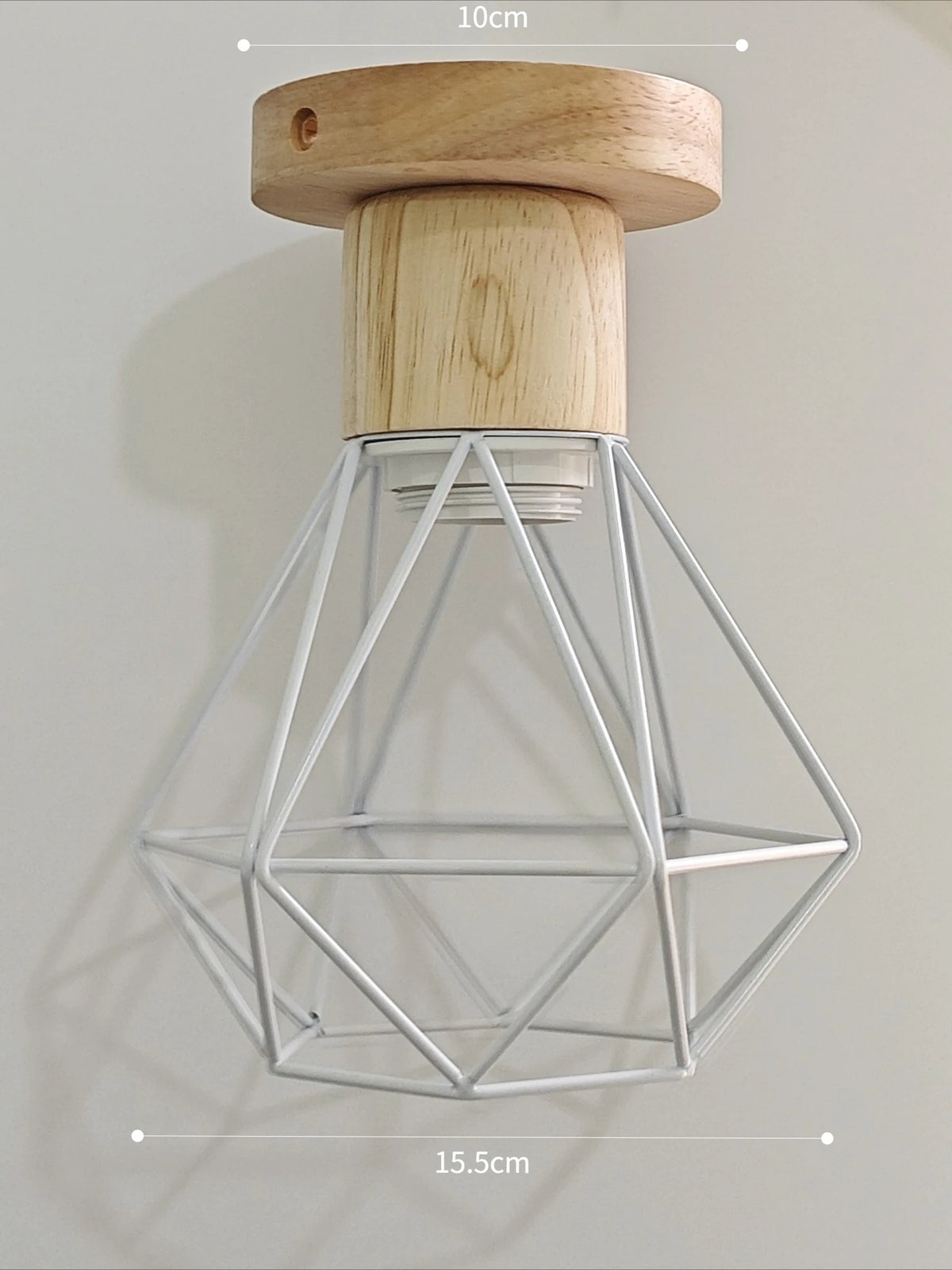 suspension lumineuse industrielle cage métal finition bois naturel ampoule filament noir moderne