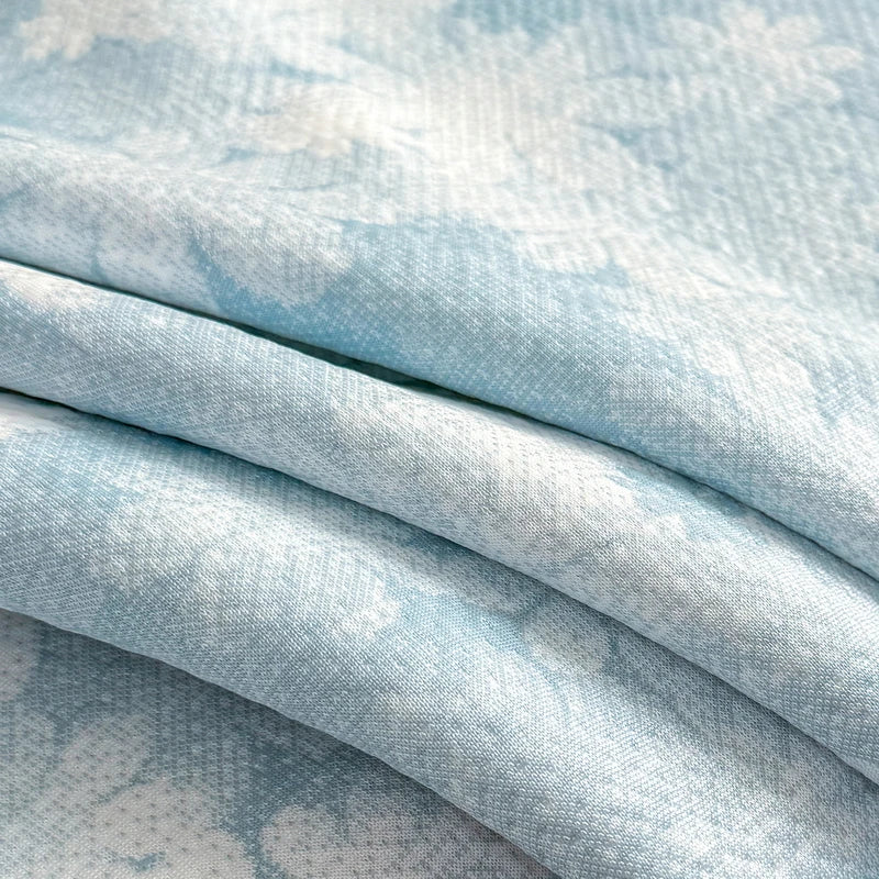 taies d'oreiller jacquard bleu clair fleurs blanches respirantes été douces 48x74cm modernes