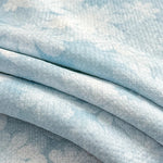 taies d'oreiller jacquard bleu clair fleurs blanches respirantes été douces 48x74cm modernes