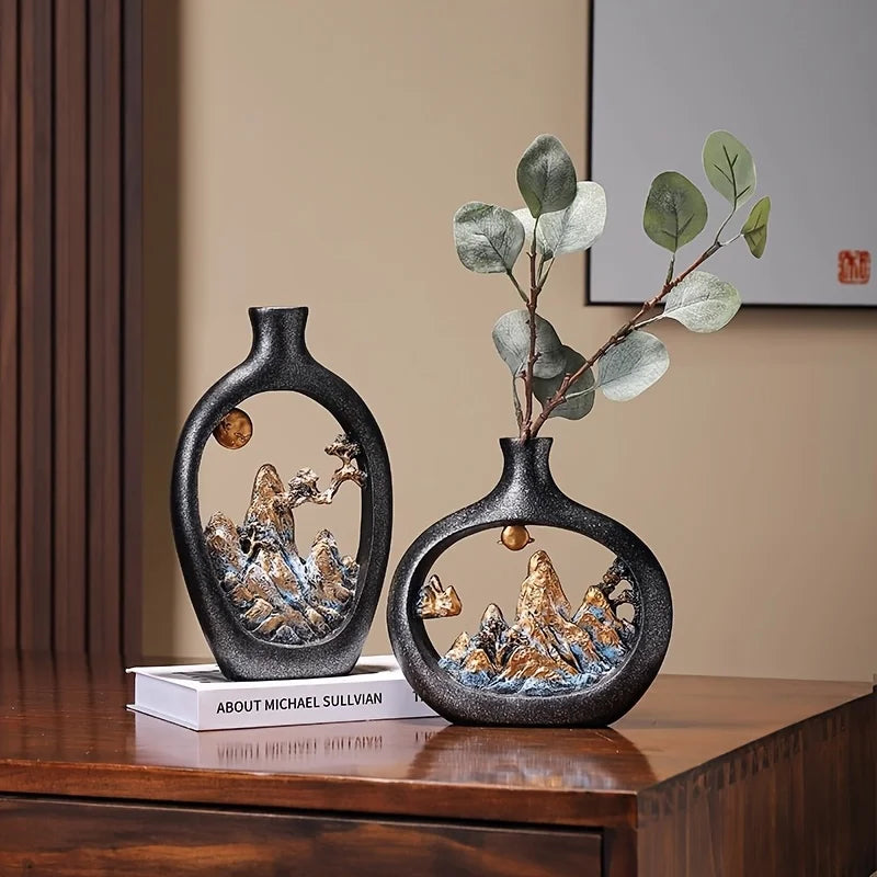 vase decoratif noir paysage montagneux relief texture mate eucalyptus branches fleurs minimalistes