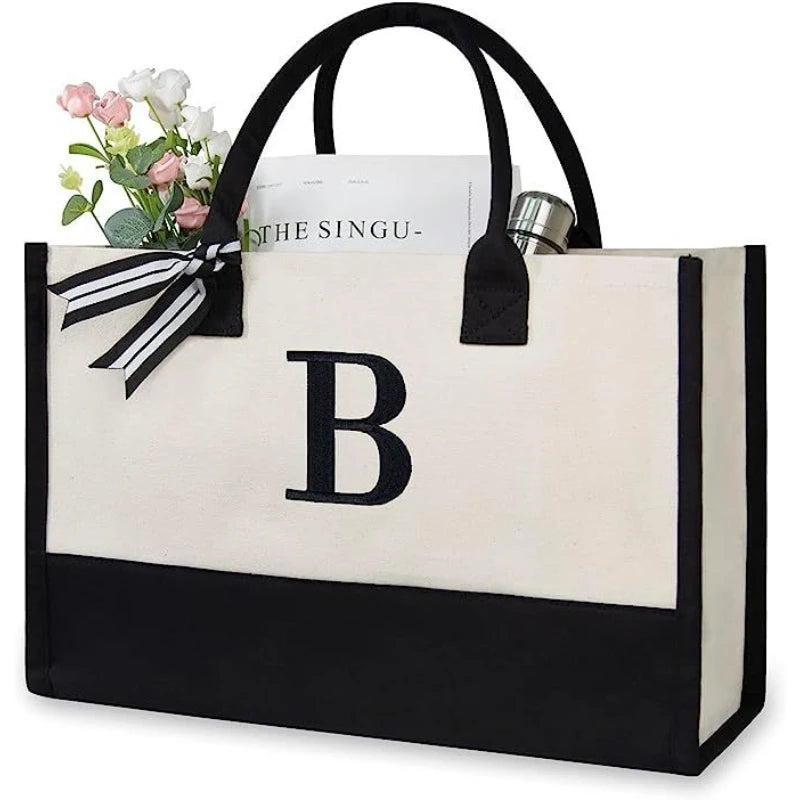 sac main toile lettre imprimée blanc noir rubans classique poignées intérieur noir zippé capacitaire