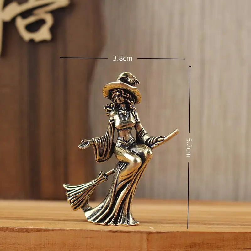 statuette sorcière bronze dorée baguette magique art deco décoration intérieure vintage figurine féminine costume