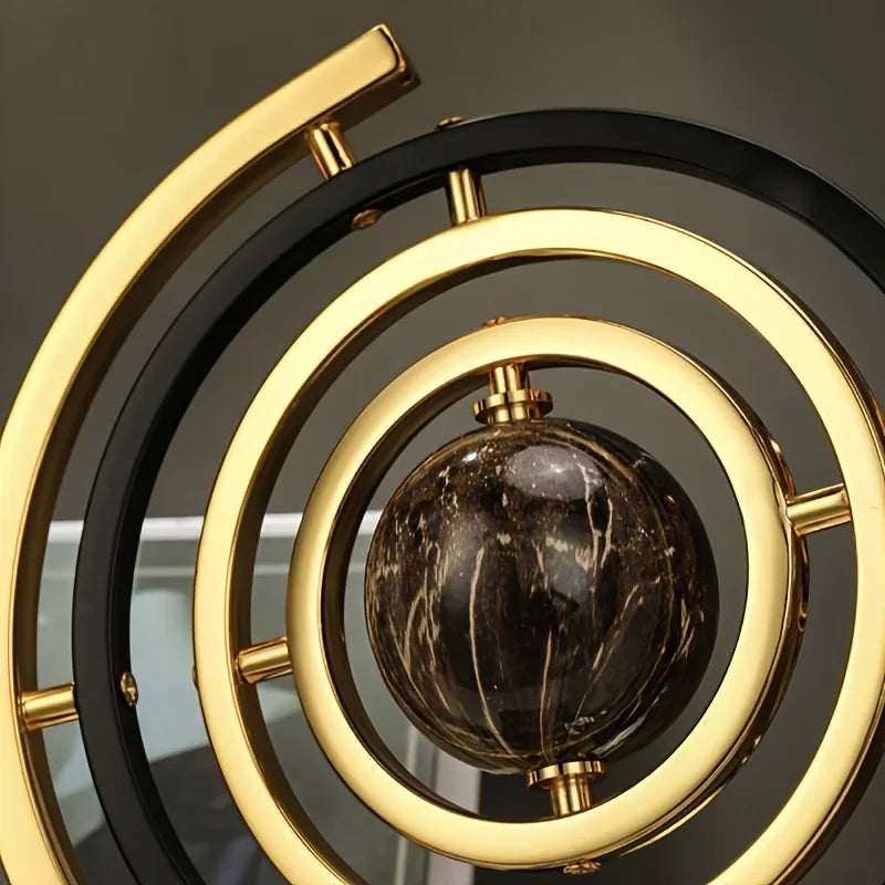 sphère artificielle moderne marbrée dorée noire décoration intérieure base carrée geometrique