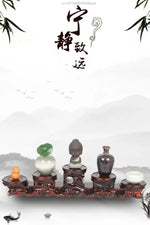 présentoir bois sculpté chinois plateformes circulaires vases céramique fleur séchée bouddha pierre