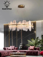 suspension lumineuse contemporaine élégante blanc doré texture organique ondulée translucent câbles suspension