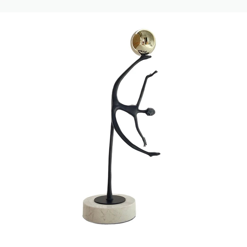 sculpture abstraite moderne danseurs noir boule dorée décoration esthétique minimaliste figure humainestylisée base pierre