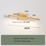 lampe murale moderne miroir bois texturé or chambre entrée minimaliste éclairage quotidien