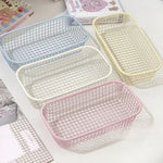 paniers rangement maille fine moderne bleu clair jaune clair rose pâle maison papeterie maquillage