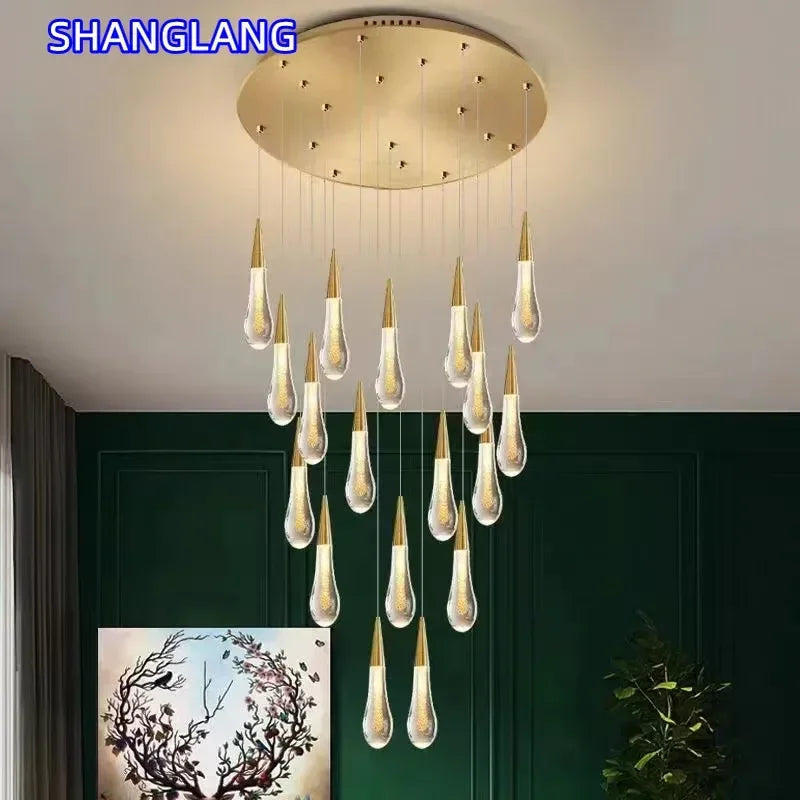 suspension lumineuse moderne cristal doré transparent gouttes verre led