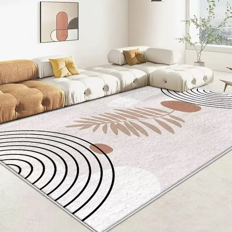 Un tapis moderne et épuré avec des motifs géométriques et végétaux en teintes douces, créant une atmosphère sereine et élégante dans cet espace de vie.