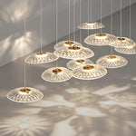 suspension lumineuse contemporaine transparente dorée ajourée salon restaurant led 4000k 3000k 6000k
