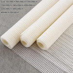 tapis protection beige clair texture tissée motifs géométriques adhésif moderne