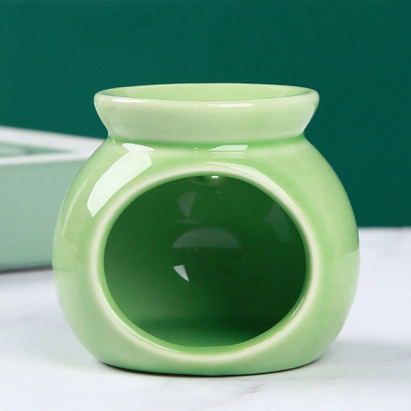 diffuseur d'odeurs brûleur d'arômes bougie céramique moderne vert bleu rouge rose jaune blanc salon