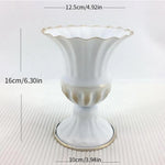 vase doré blanc gris floral classique élégant intérieur extérieur bouquets multiples support table arrangements