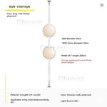 lampe sol moderne métal chromé boule acrylique blanche lumière led salon décoration intérieure