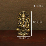 statues ganesha bronze doré sculptures détaillées motifs floraux traditionnel hindou maison