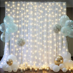 rideaux tulle plissé guirlande lumineuse ballons mariage anniversaire décoration événement festive romantique