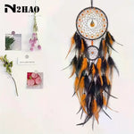 attrape rêves plumes violet noir rose traditionnel artisanal concentrique métal