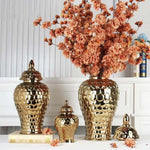 vases décoratifs modernes or blanc argentés motifs ronds couvercles assortis