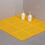 tapis salle bain blanc bleu turquoise vert gris jaune rose moderne minimaliste petits trous